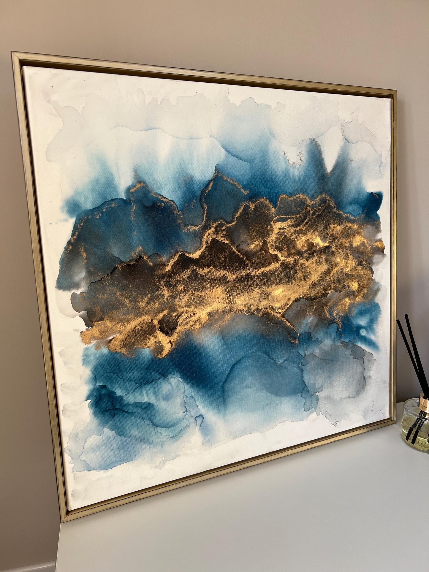 Golden Echoes: Fluid Motion in Blue & Gold Ink Large 50cm Canvas