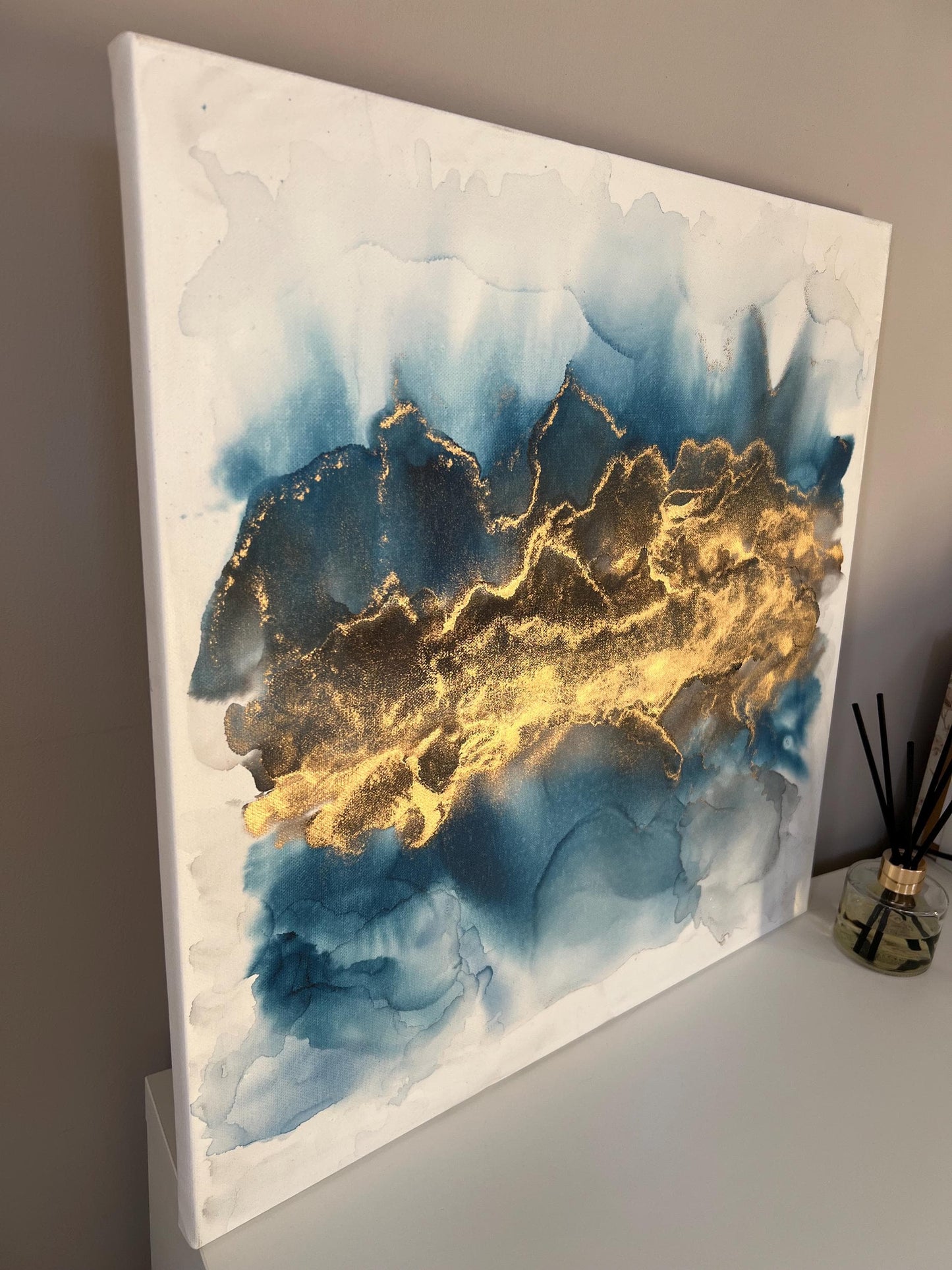 Golden Echoes: Fluid Motion in Blue & Gold Ink Large 50cm Canvas