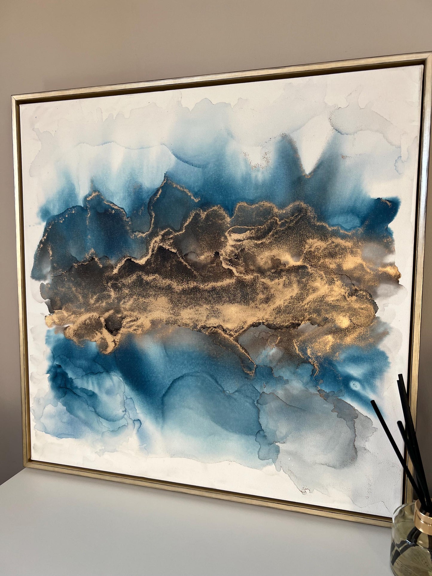 Golden Echoes: Fluid Motion in Blue & Gold Ink Large 50cm Canvas