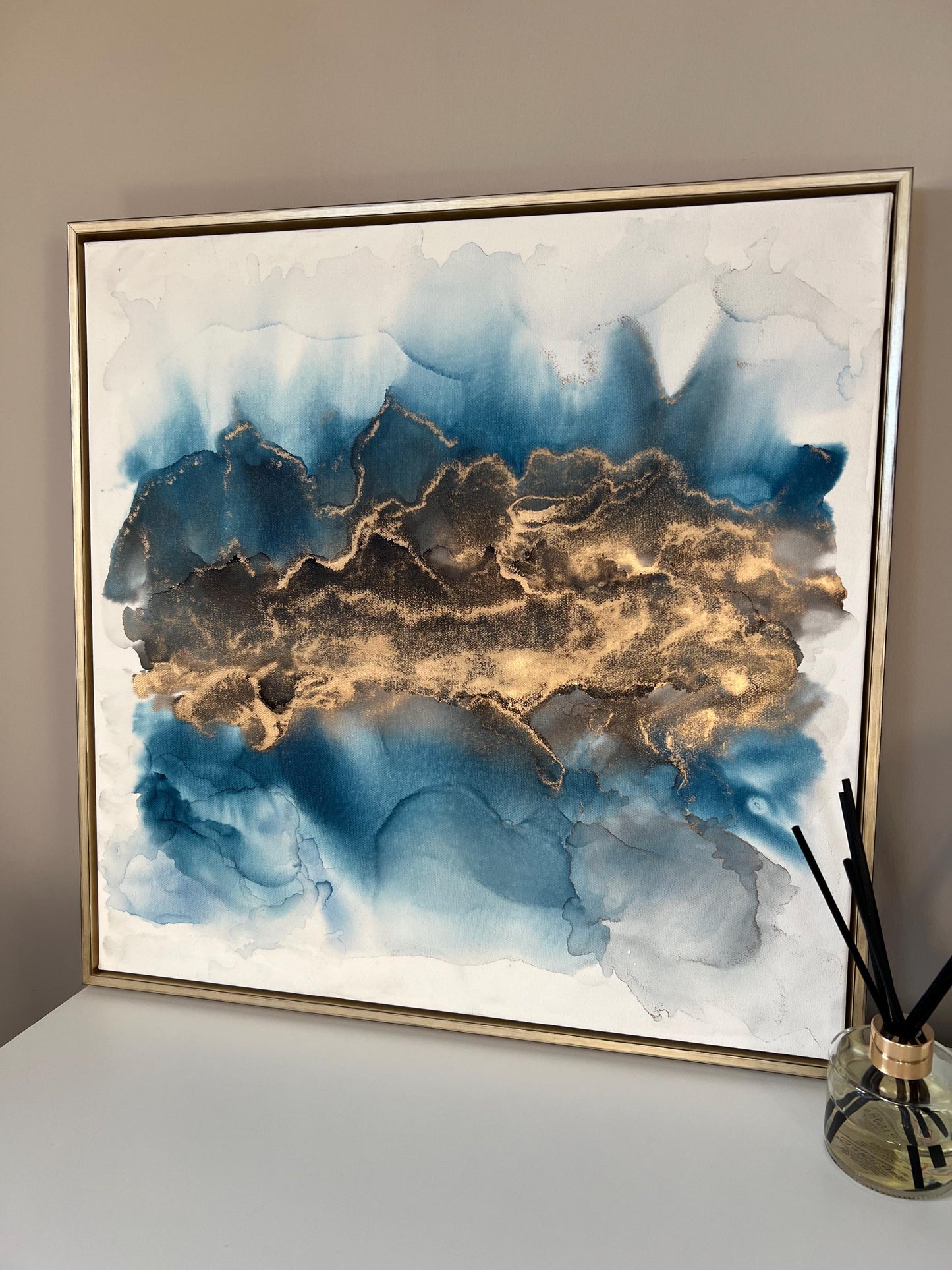 Golden Echoes: Fluid Motion in Blue & Gold Ink Large 50cm Canvas
