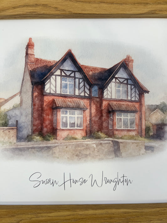 Close up of a framed artwork of a tudor style period house portrait in digital watercolour.